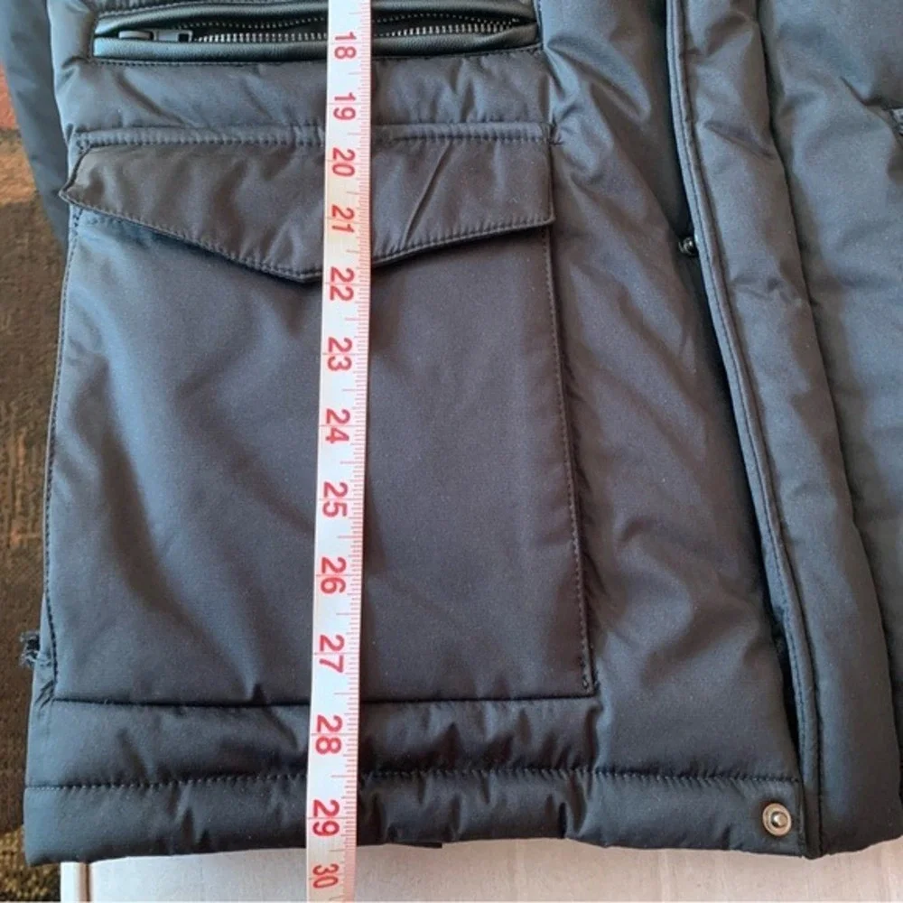 PRONTO UOMO. NWOT. Black jacket w/faux leather trim on shoulder. Three pockets.